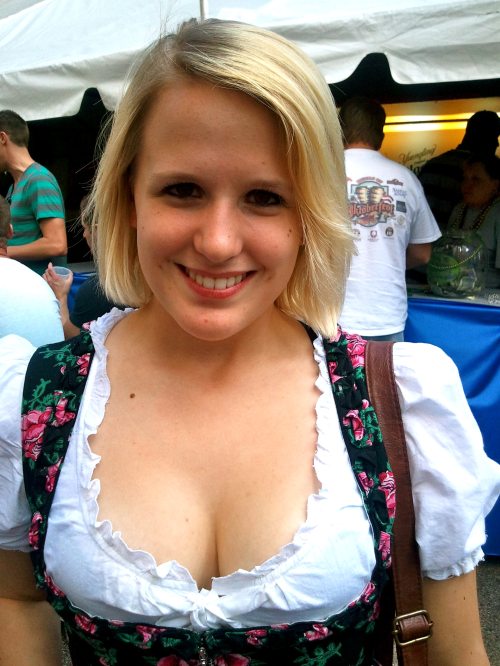 1girl bavaria blonde_hair breasts cleavage dirndl dress female german oktoberfest short_hair smile solo_focus
