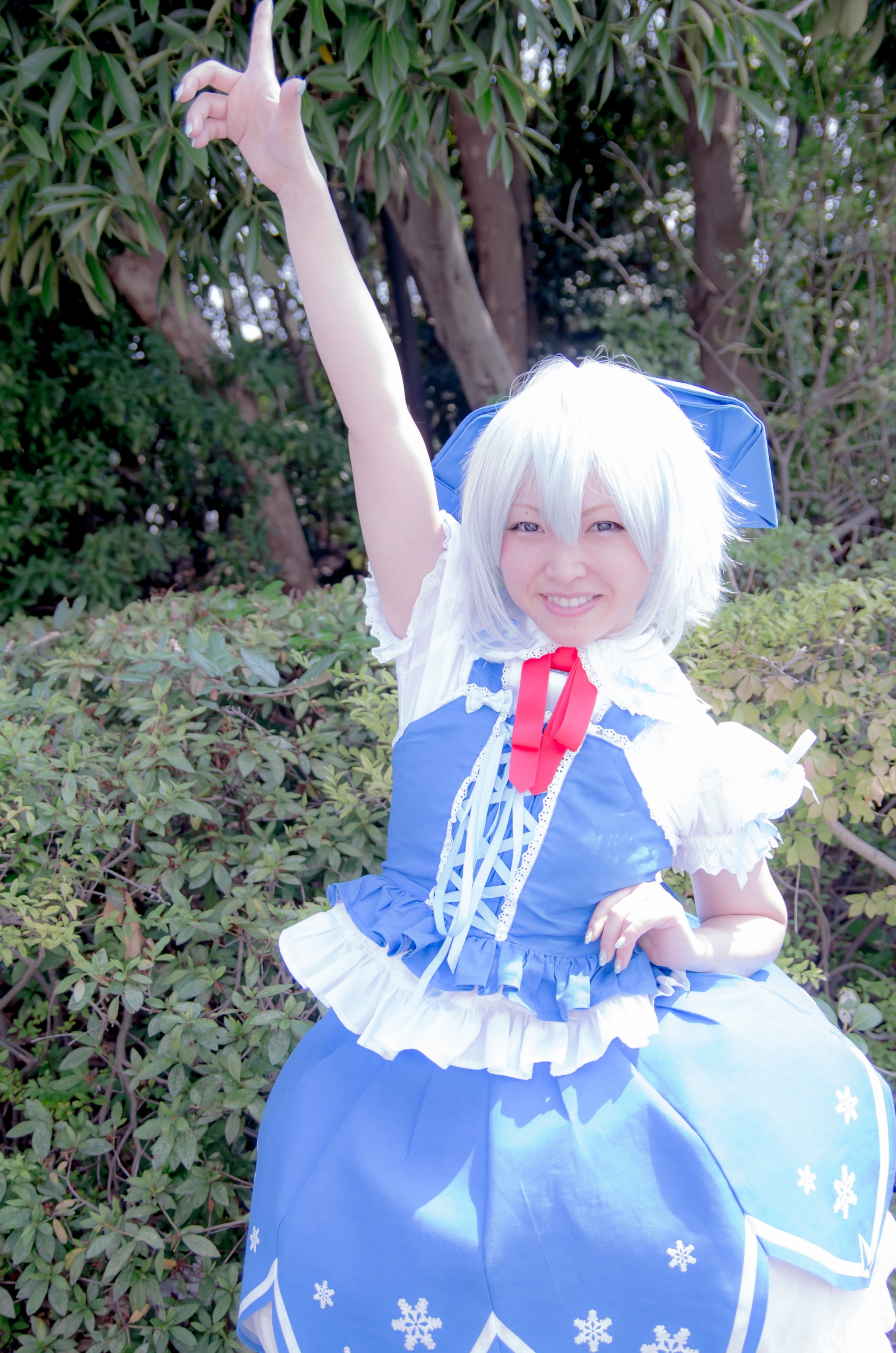 1girl asian blue_hair breasts cirno cosplay dress female grey_hair japanese outside short_hair smile solo touhou