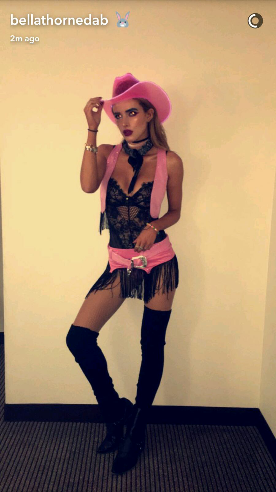 1girl bella_thorne celebrity choker cleavage clothed dark_hair fake_nails female female_only hat high_heel_boots looking_away non-nude snapchat solo thigh_boots white
