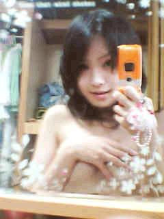 1girl asian breast_hold breasts camera female female_only lowres phone qvga solo solo_female