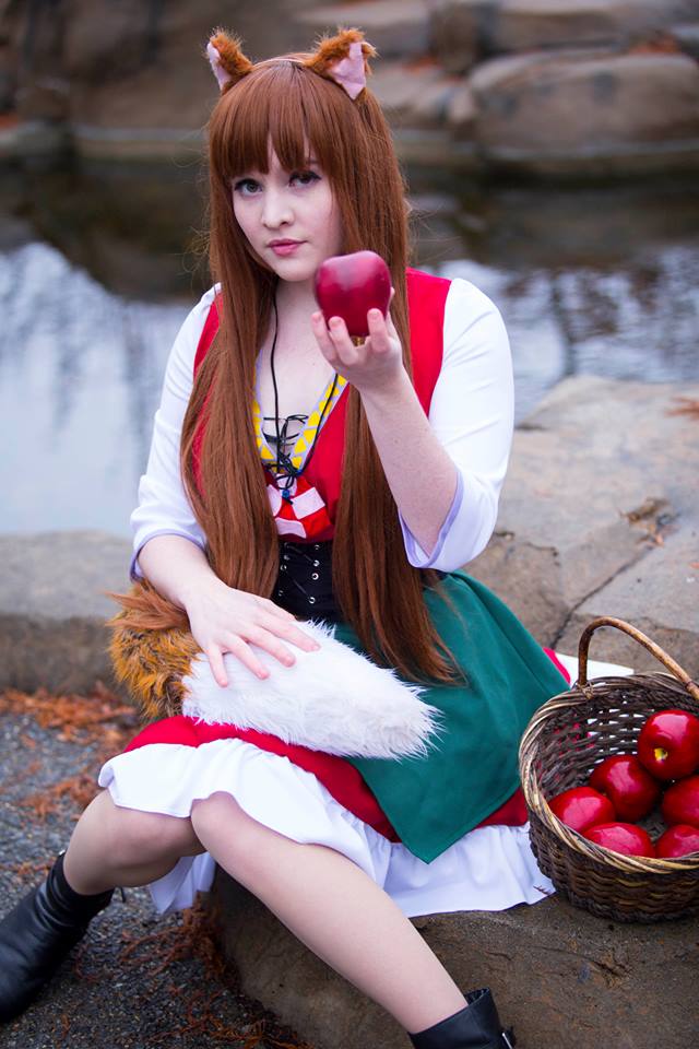 1girl apple breasts cosplay female foxycosplay holo long_hair sitting solo spice_and_wolf tagme