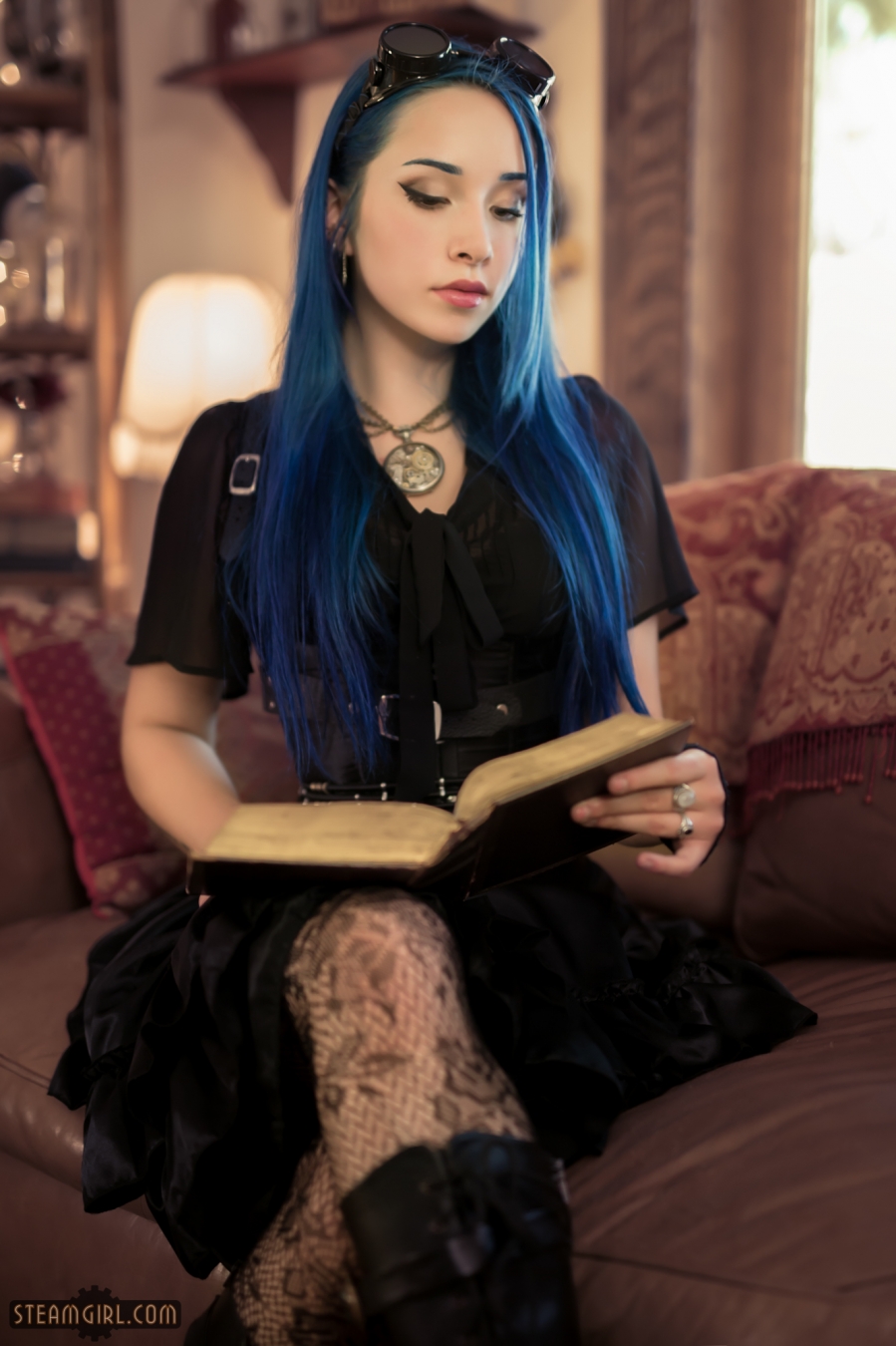 blue_hair breasts female goggles long_hair solo tattoo watermark