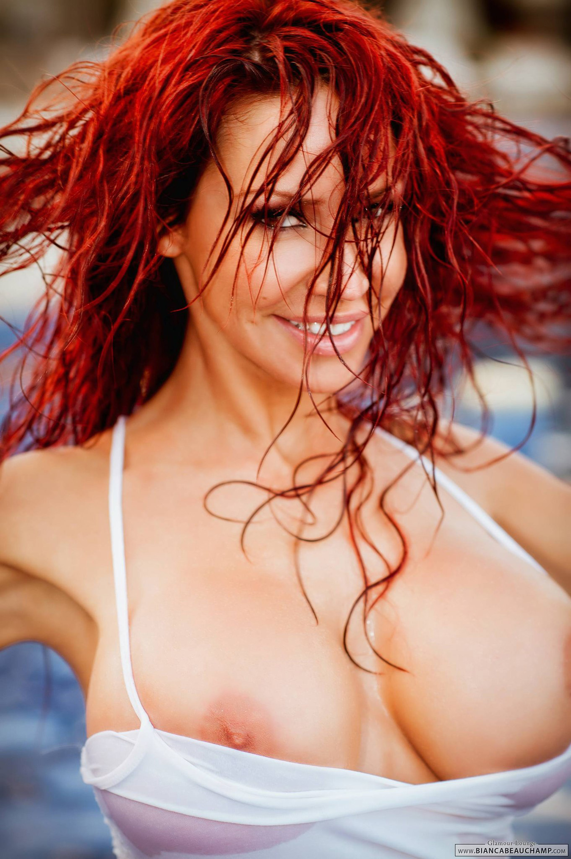 bianca_beauchamp breasts female large_breasts long_hair nipples red_hair see-through smile solo water wet