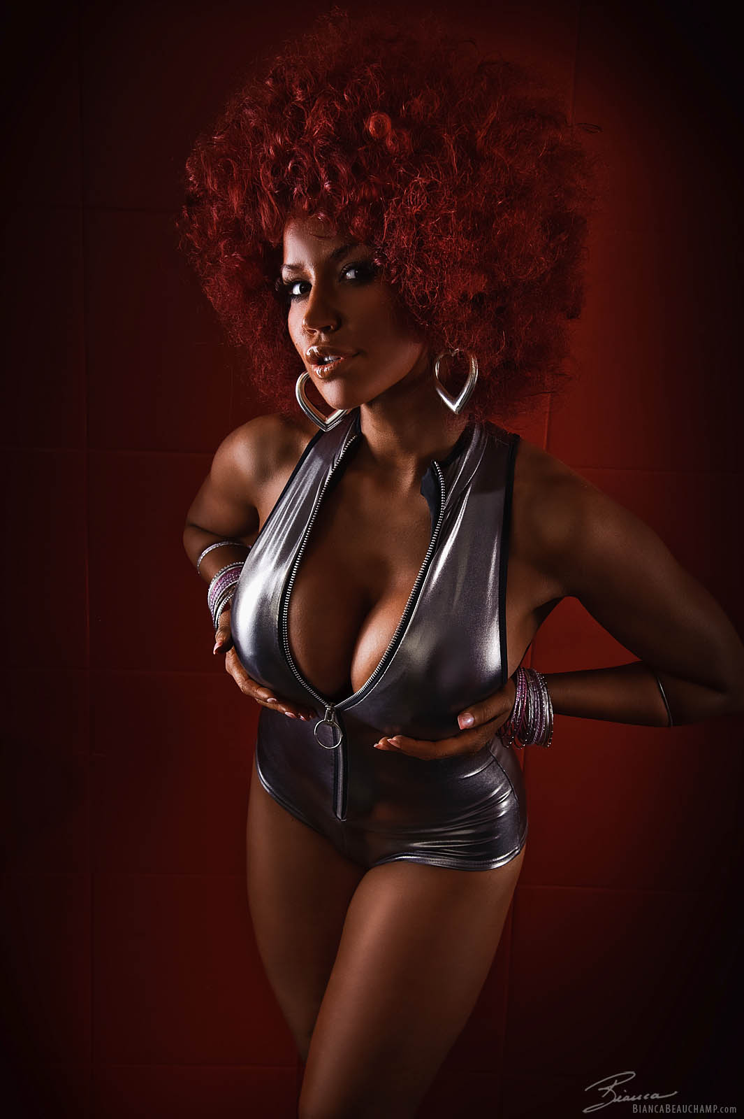 afro bianca_beauchamp breasts earrings female large_breasts long_hair red_hair solo watermark