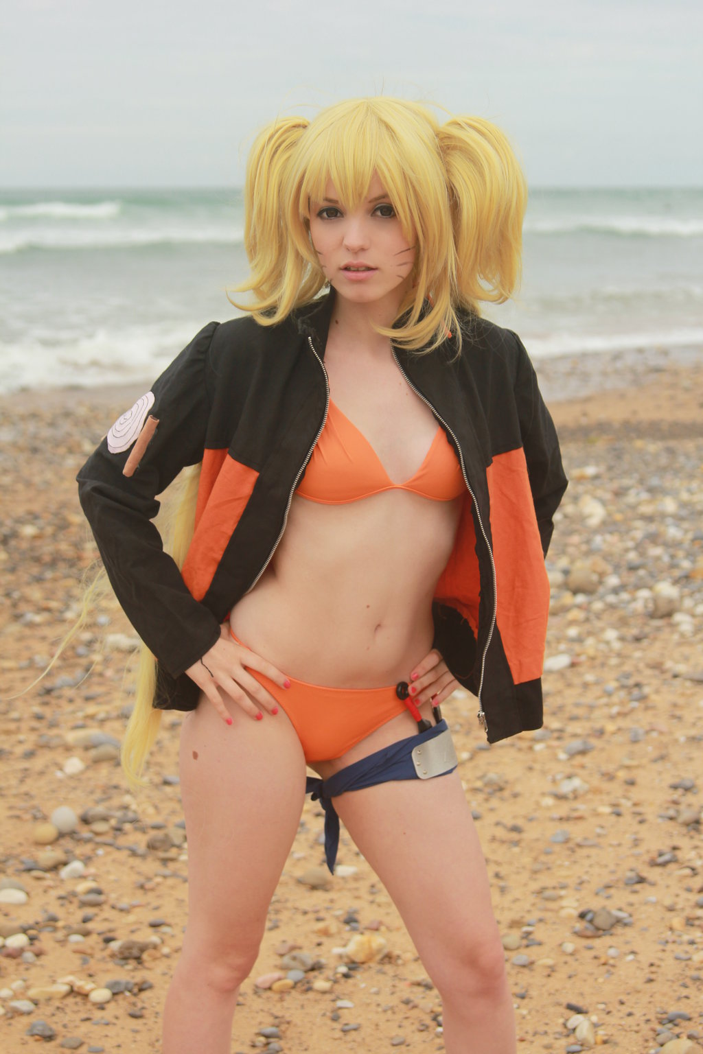 1girl ass bare_legs beach bikini blonde_hair brown_eyes cosplay eyeshadow female female_only fingers hand_on_hip hands hips legs lipstick long_hair looking_at_viewer makeup naruko naruto nose open_clothes open_mouth orange_bikini panties sand shiny shiny_skin sky small_breasts solo stomach teeth tied_hair twintails water