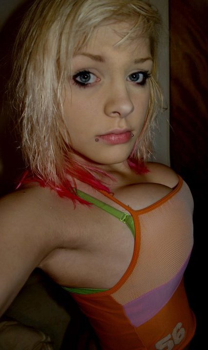 1girl amateur armpits blonde_hair blue_eyes cleavage emo female piercings solo