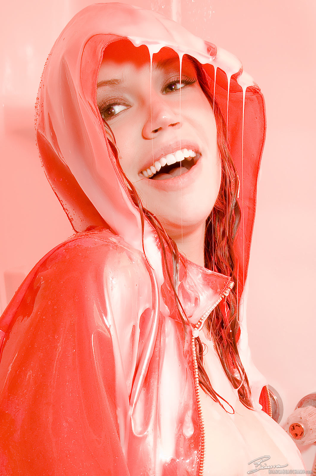bianca_beauchamp breasts cleavage female large_breasts latex long_hair lotion nail_polish raincoat red_hair shower solo watermark wet