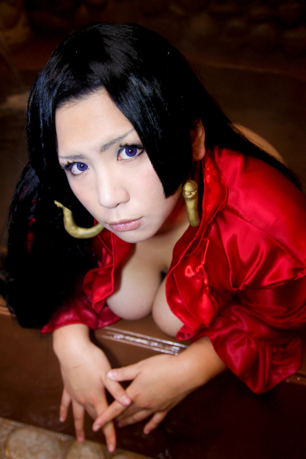 asian bed black_hair breasts chouzuki_maryou cleavage cosplay earrings female huge_breasts long_hair solo