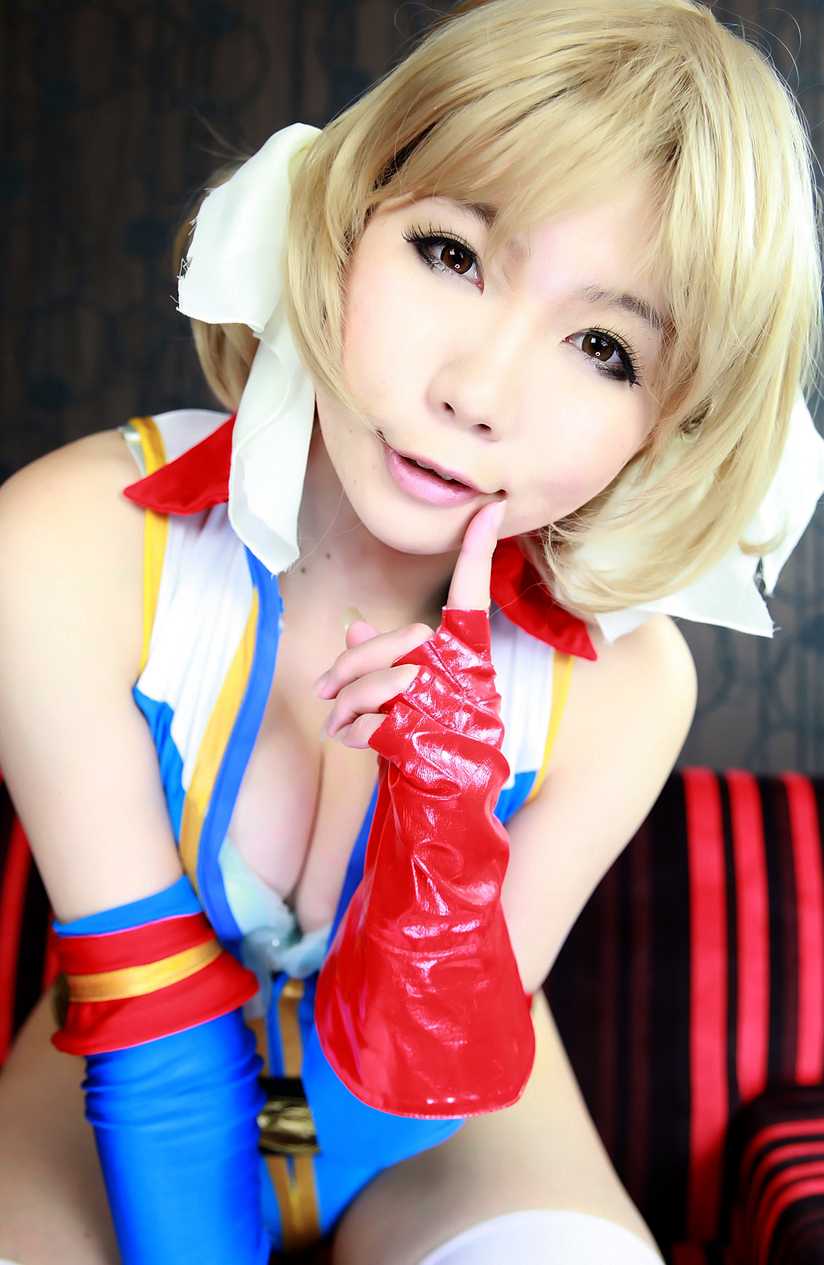 asian blonde_hair breasts female gloves pigtails short_hair solo