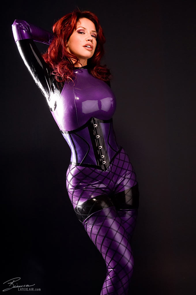 bianca_beauchamp breasts catsuit female gloves large_breasts latex long_hair red_hair simple_background solo watermark