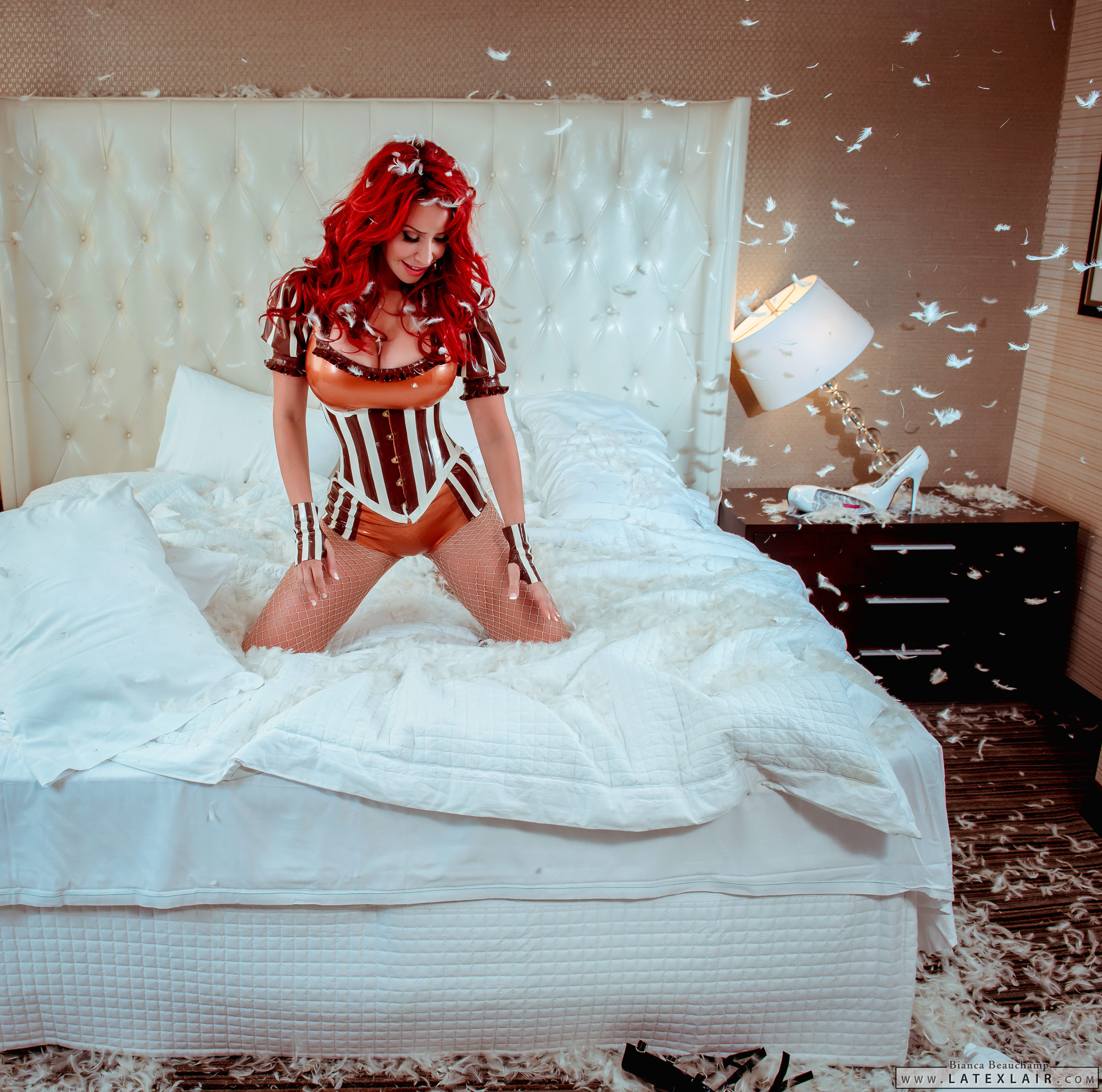 bed bianca_beauchamp breasts cleavage corset female fishnets large_breasts long_hair red_hair solo thighhighs watermark