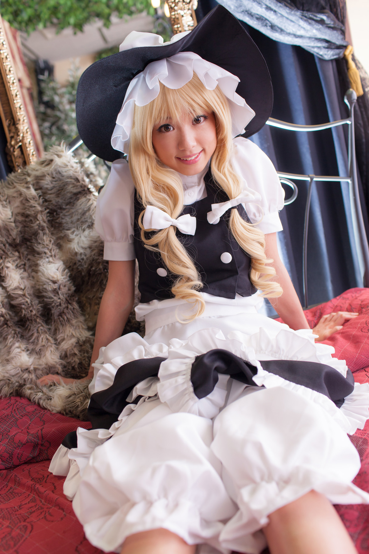 asian bed blonde_hair breasts cosplay dress female hat long_hair shoes sitting socks solo
