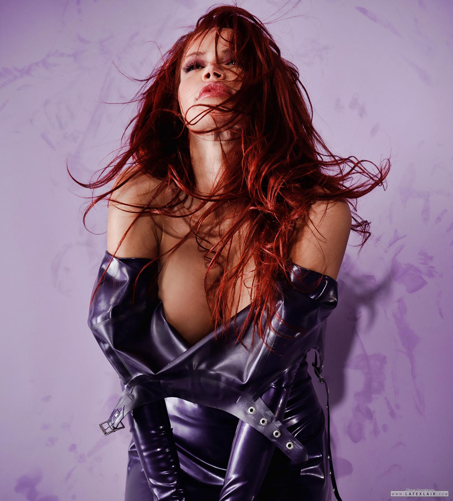bianca_beauchamp breasts female gloves large_breasts latex long_hair red_hair simple_background solo watermark
