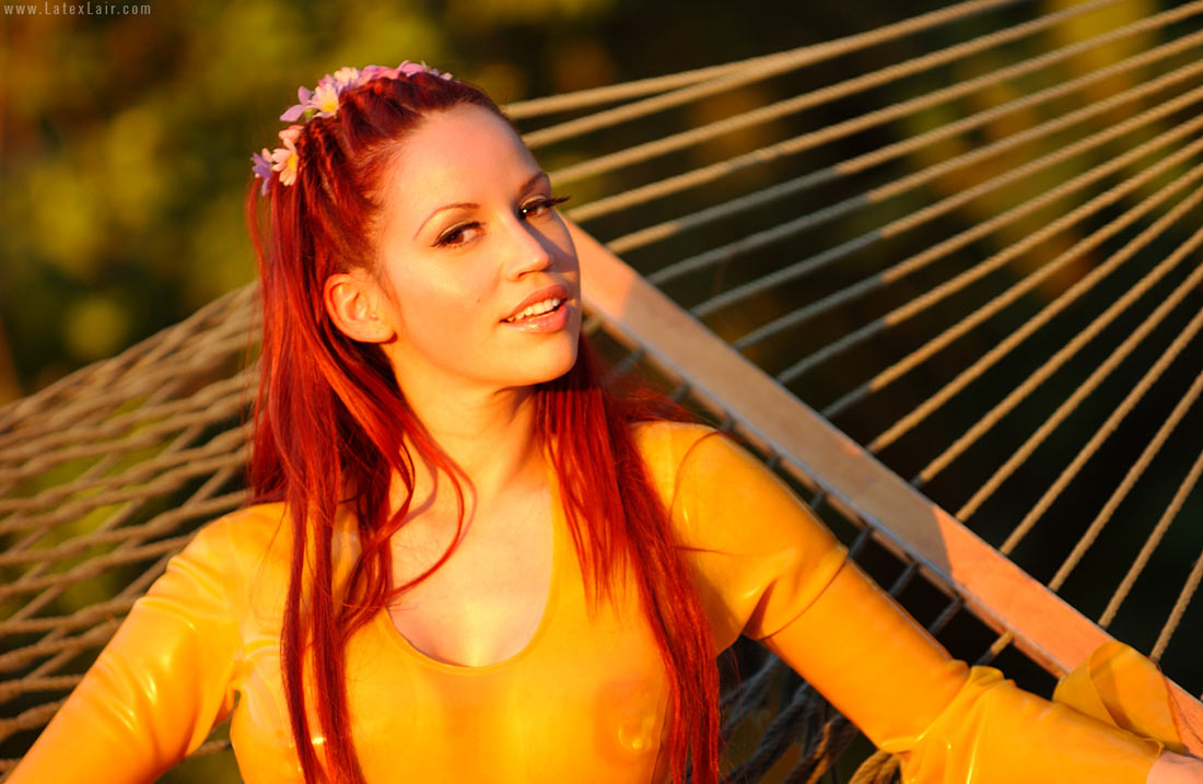 bianca_beauchamp breasts female large_breasts latex long_hair red_hair solo watermark