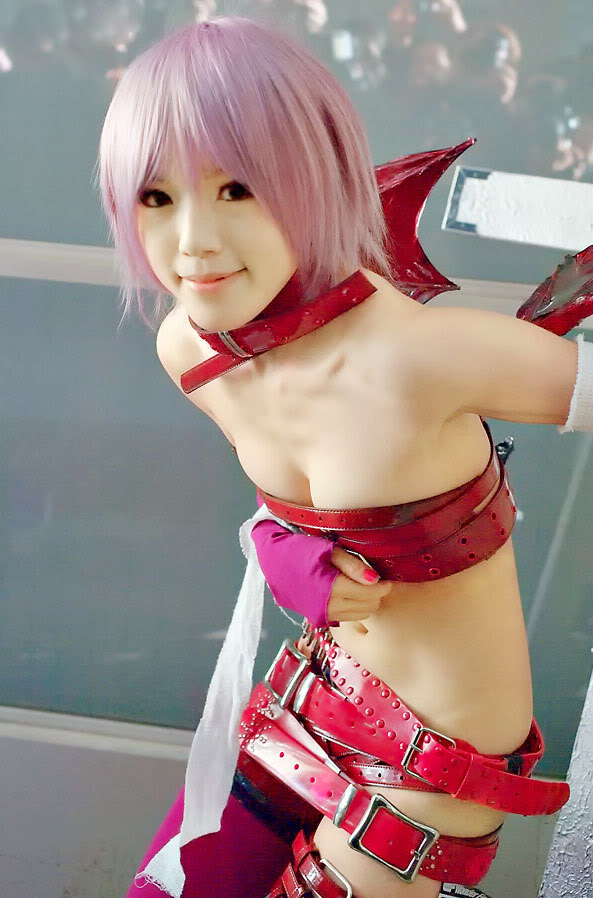 1girl asian bare_shoulders breasts capcom choker cosplay darkstalkers female female_only lilith_aensland long_hair looking_at_viewer midriff navel non-nude partially_clothed pink_hair smile solo succubus