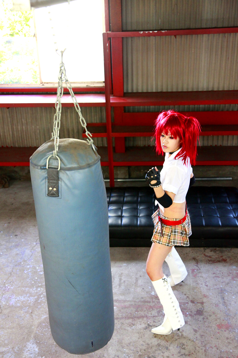 boots breasts female high_heels long_hair midriff pigtails punching_bag red_hair skirt solo