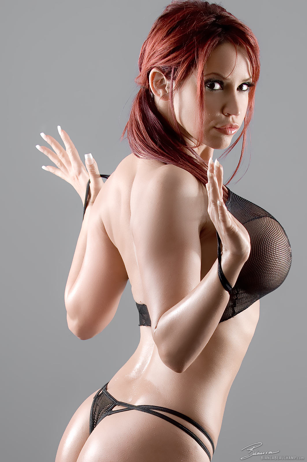 ass bianca_beauchamp breasts female large_breasts long_hair looking_back red_hair solo