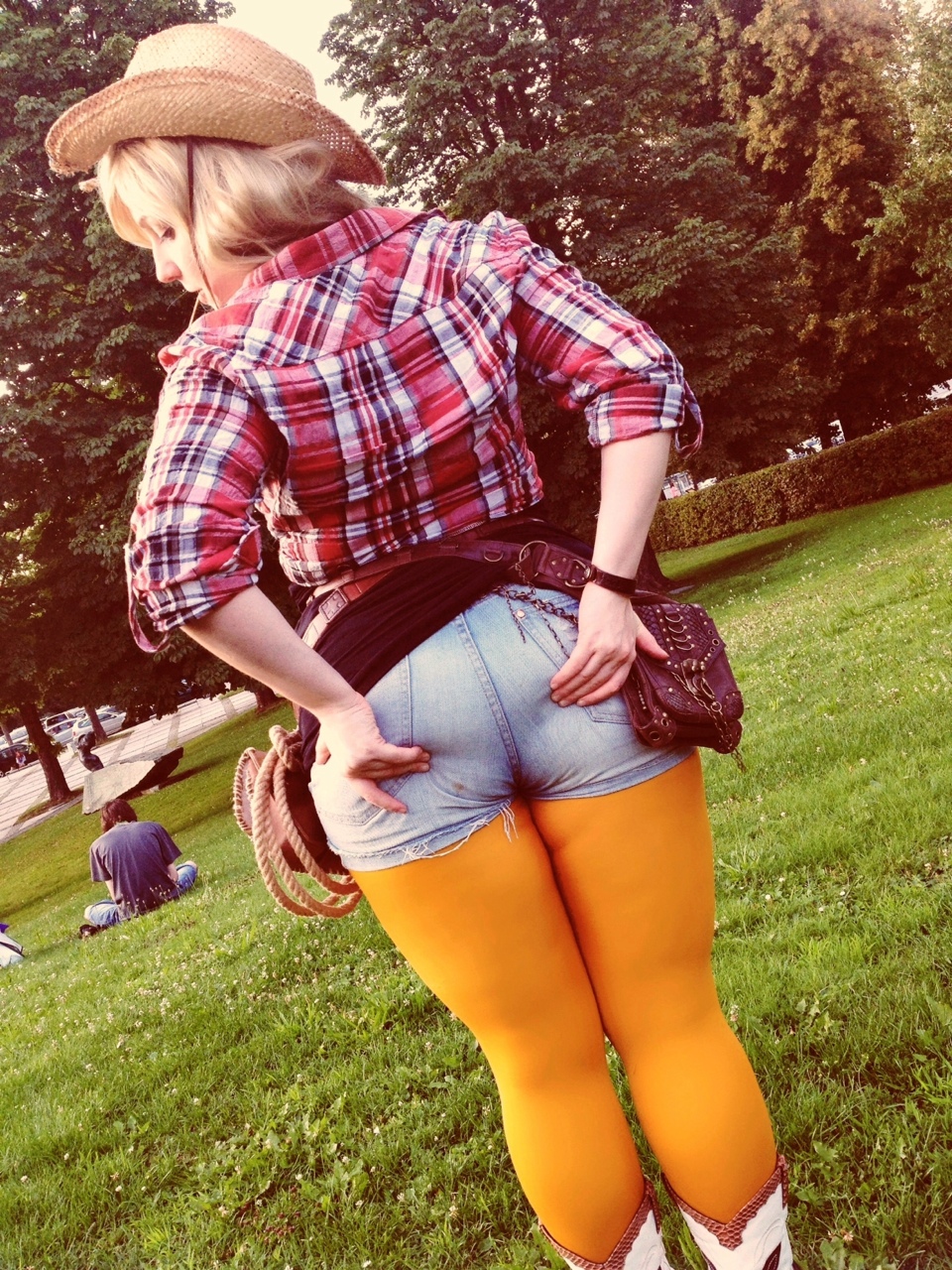 applejack_(mlp) ass ass_grab blonde_hair cosplay dat_ass glasmond hat leggings plaid_shirt shorts