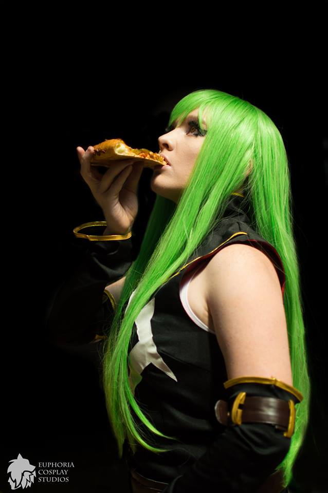 1girl breasts c.c. code_geass cosplay female green_hair long_hair pizza solo tagme