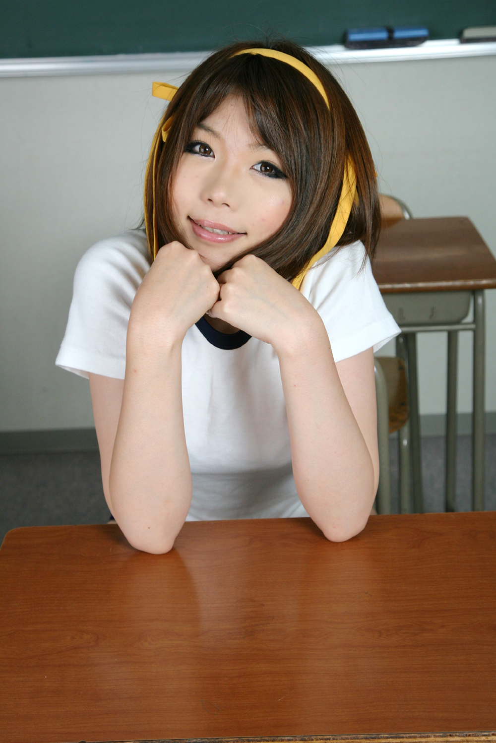 asian breasts brown_hair cosplay desk female hairband school shoes short_hair socks solo