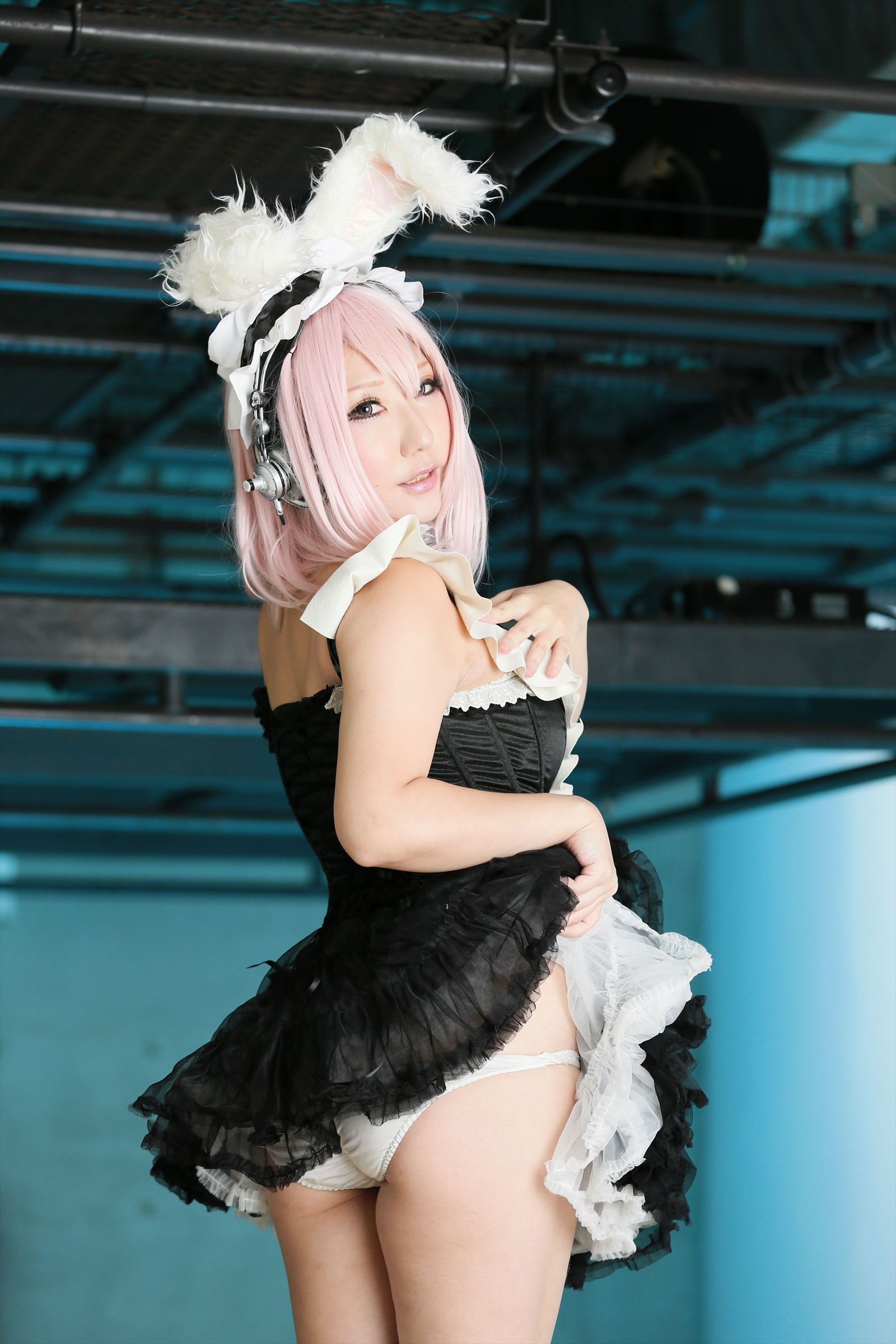 asian ass breasts bunny_ears female headphones large_breasts long_hair looking_back pink_hair shooting_star solo super_sonico
