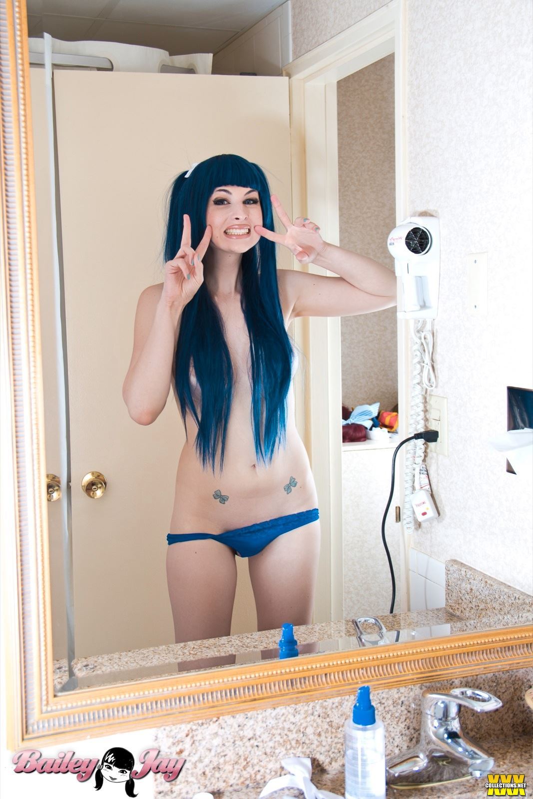 bailey_jay bathroom blue_hair breasts bulge large_breasts long_hair mirror panties shemale solo tattoo watermark