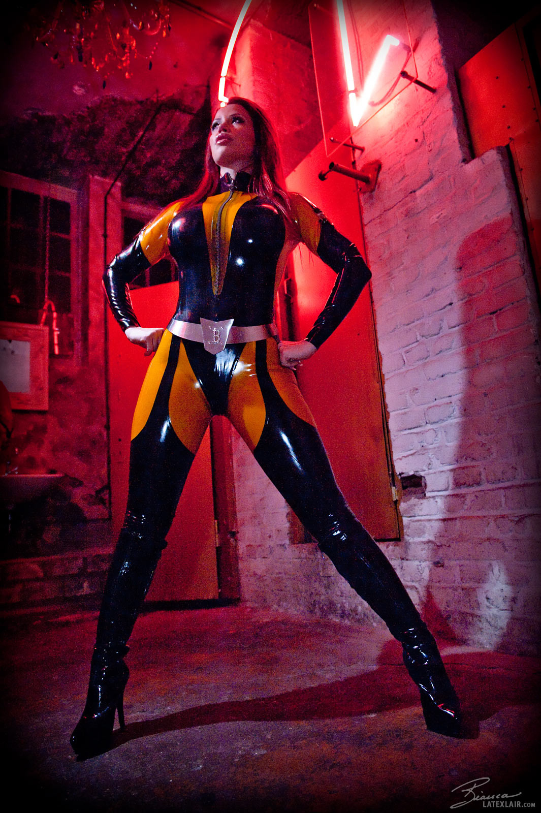 bianca_beauchamp breasts female large_breasts latex long_hair red_hair solo watermark