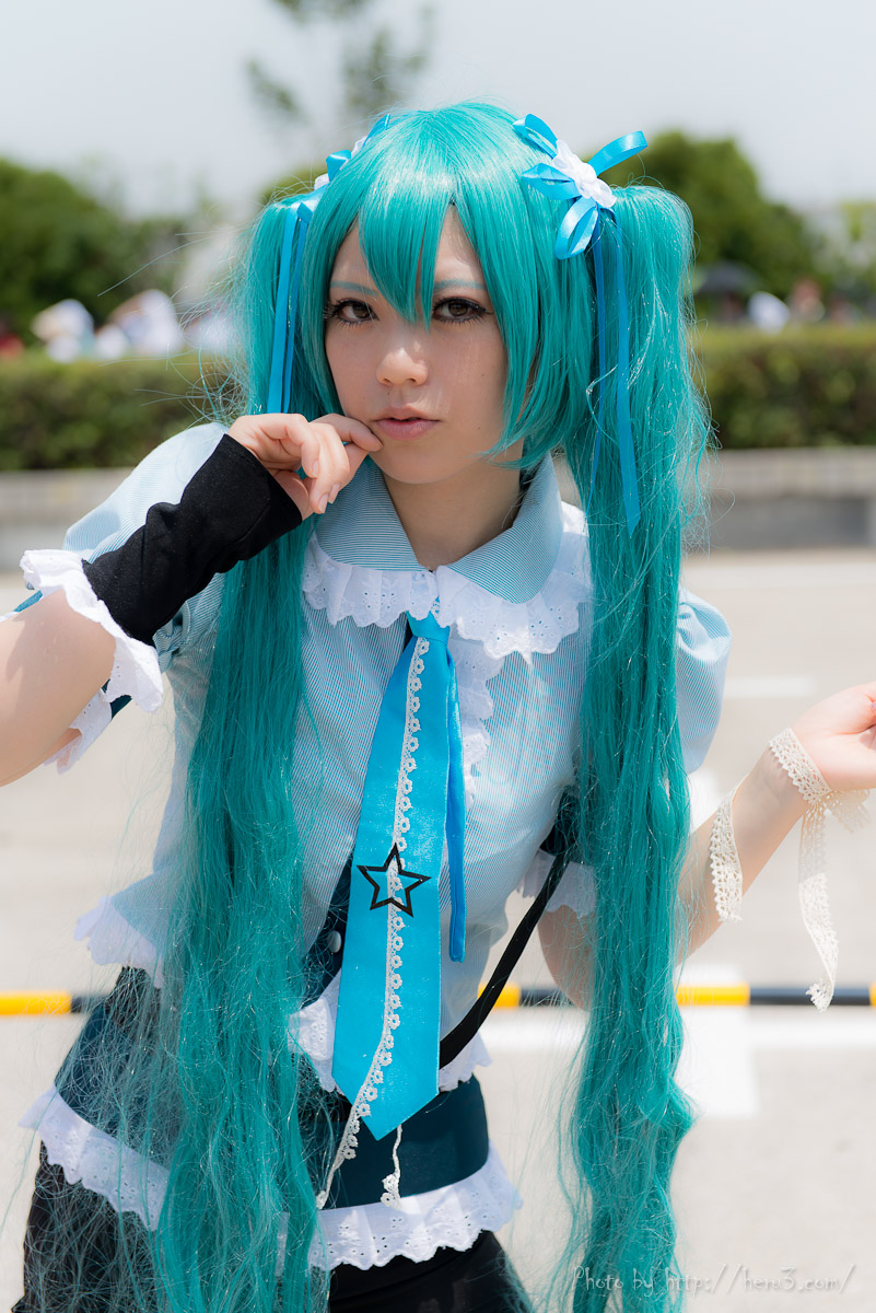 aqua_hair asian breasts cosplay female hatsune_miku long_hair necktie outside pigtails solo