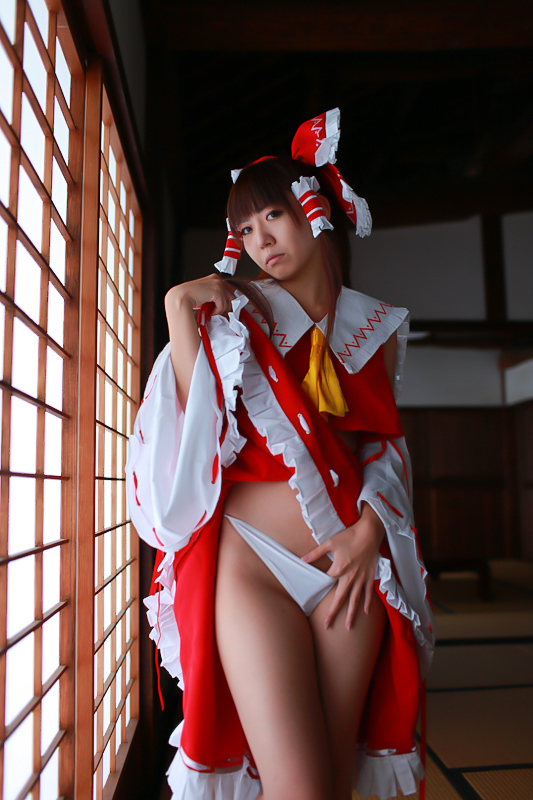 asian breasts brown_hair cosplay female long_hair pigtails socks solo touhou