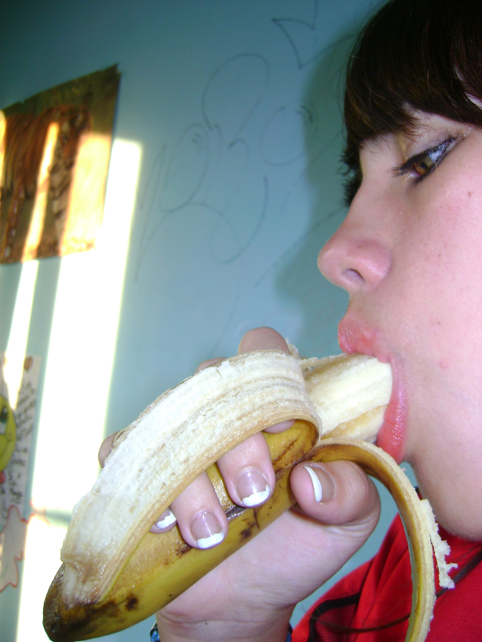 1girl banana banana_in_mouth brunette female female_focus female_only model_request phallic photo real_person selfie simple_background solo solo_female solo_focus source_request suck sucking suggestive suggestive_food
