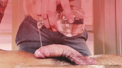 animated clothed_on_nude gay gif male male_only oil on_back penis pitcher uncensored wet