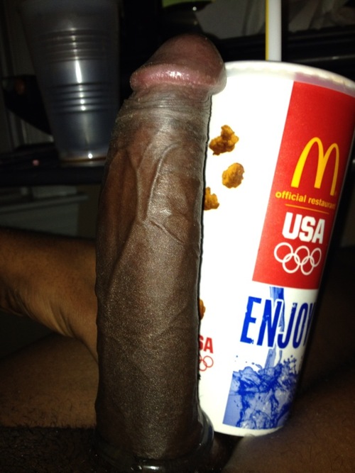 bbc cock_ring dark-skinned_male dark_skin erection huge_penis male nude sitting size_difference