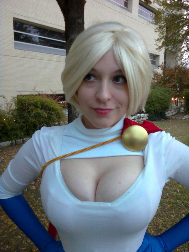 1girl big_breasts blonde_hair breasts cleavage cosplay dc dc_comics female female_only hair hands_on_hips lipstick non-nude photo power_girl real_person solo