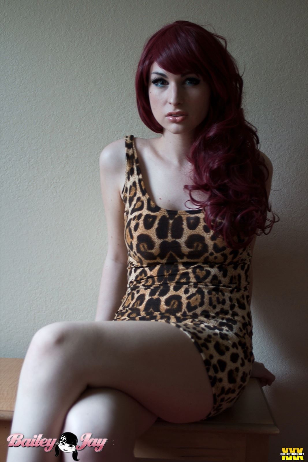 bailey_jay breasts large_breasts long_hair red_hair shemale sitting solo watermark
