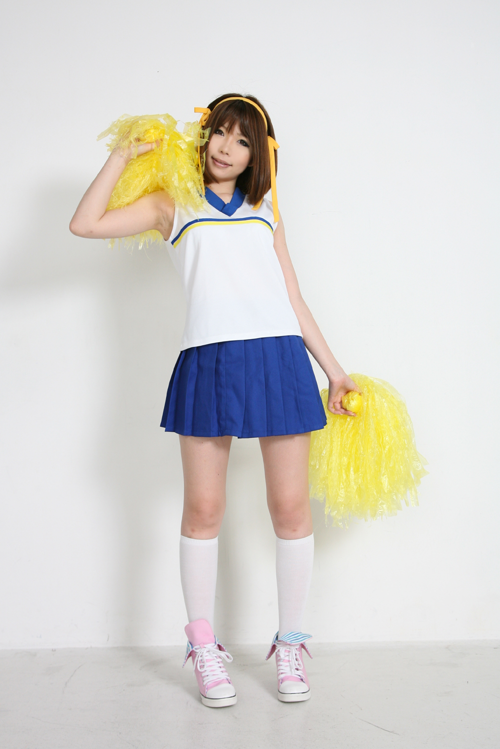 asian breasts brown_hair cheerleader cosplay female hairband shoes short_hair skirt socks solo