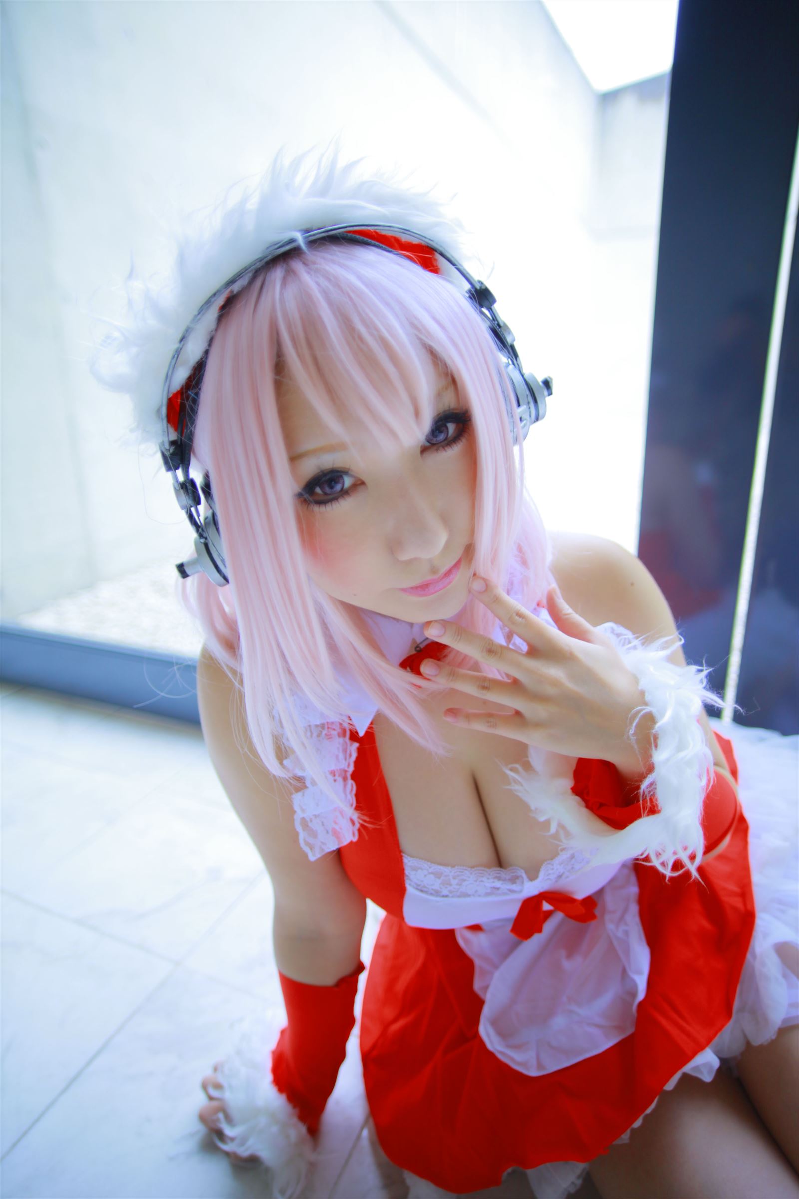 asian breasts female headphones large_breasts long_hair pink_hair shooting_star solo super_sonico
