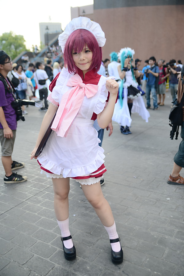 asian breasts cosplay female long_hair maid outside red_hair shoes socks solo