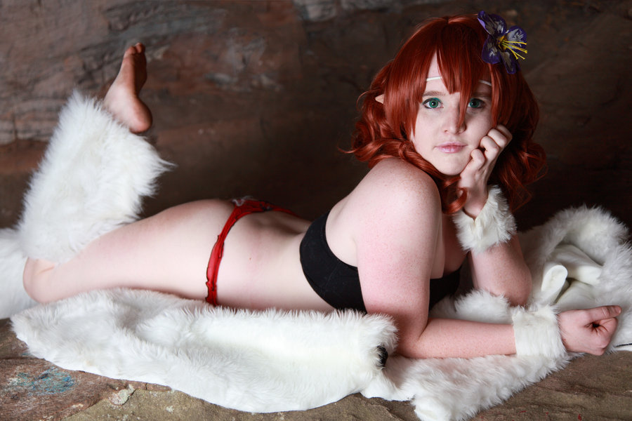 ayame_(inuyasha) breasts cosplay female foxycosplay inuyasha long_hair lying lying_on_stomach red_hair solo tagme