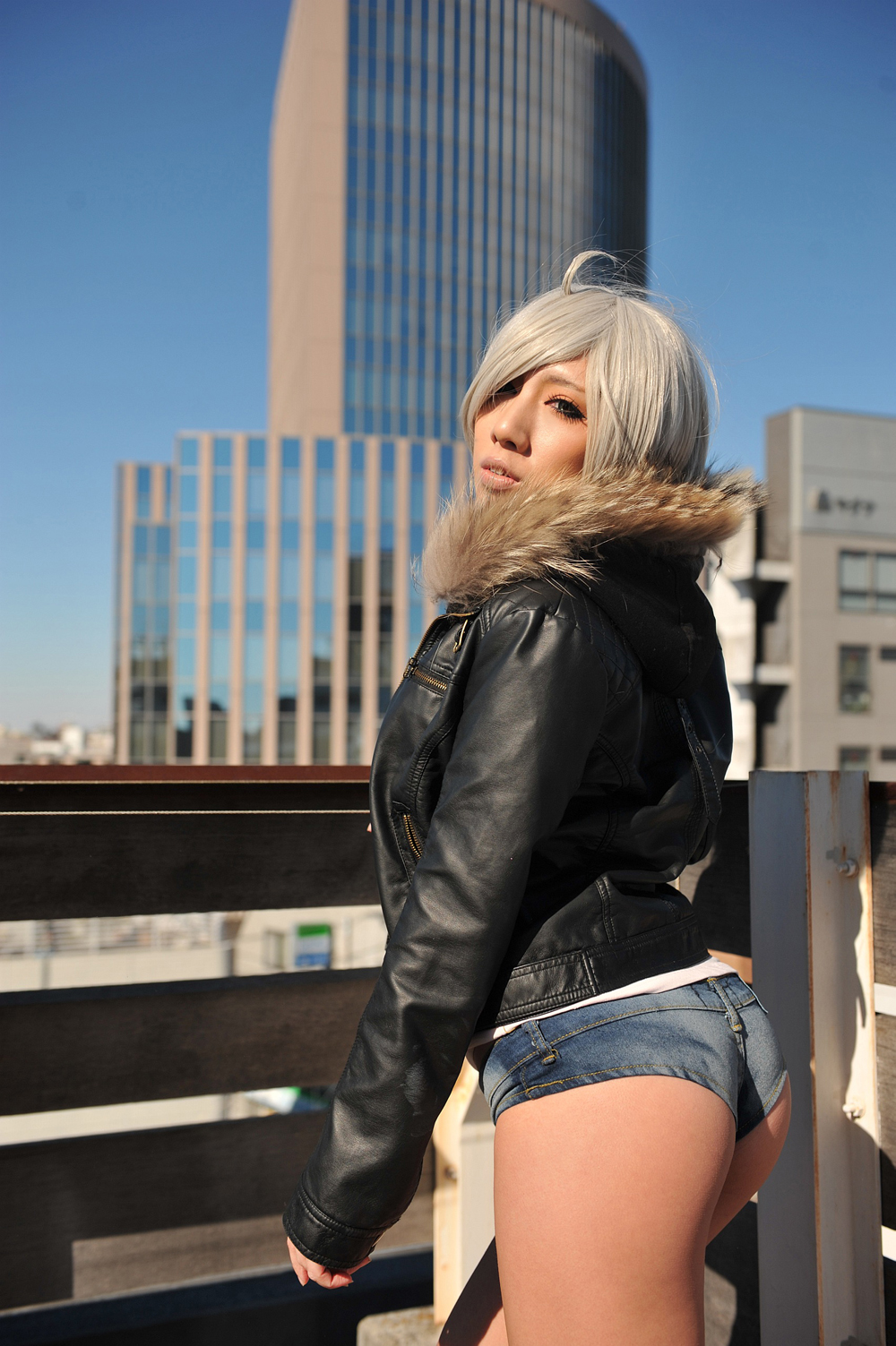 asian ass boots breasts female hotpants jacket large_breasts looking_back nonsummerjack short_hair solo white_hair