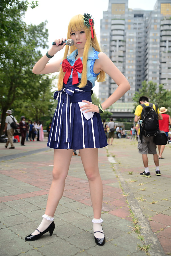 asian blonde_hair breasts cosplay female high_heels long_hair microphone ribbon shoes skirt socks solo