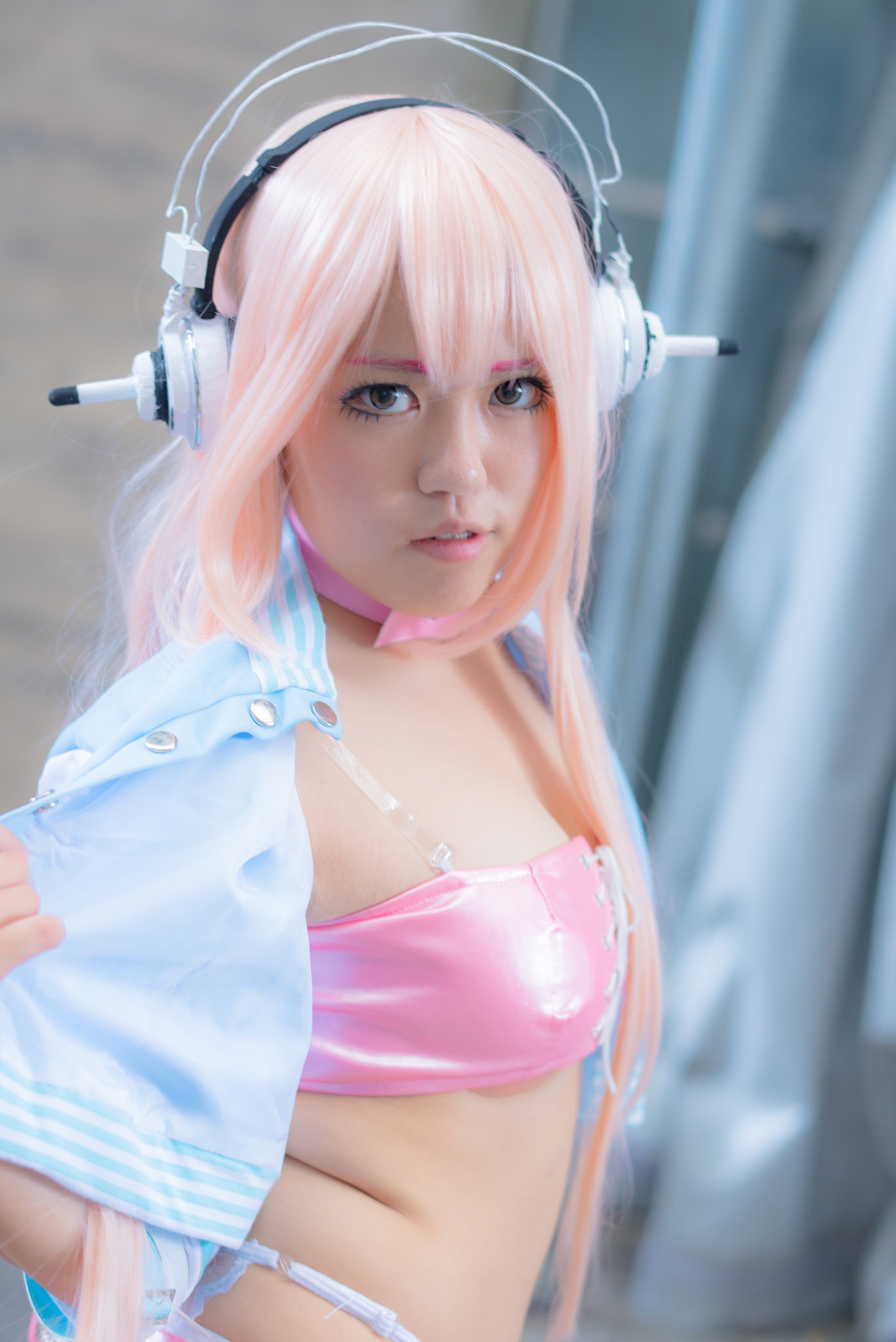 asian breasts cleavage collar cosplay female headphones large_breasts long_hair midriff navel pink_hair solo