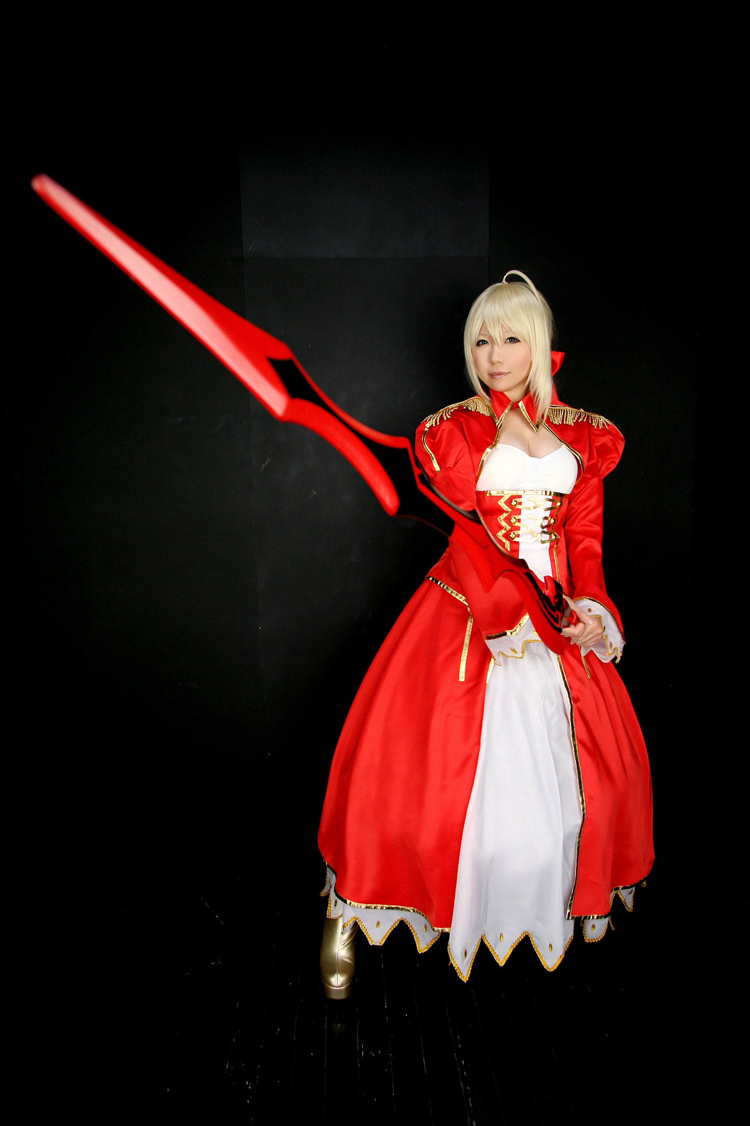 asian blonde_hair boots breasts cosplay dress female high_heels long_hair solo sword