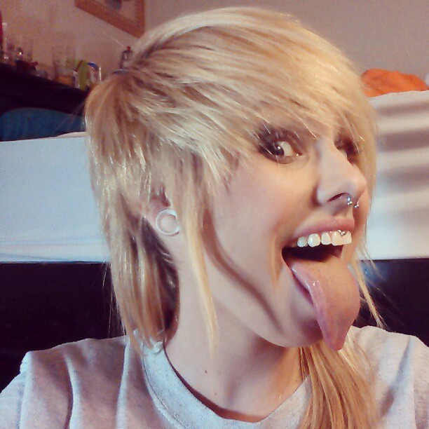 1girl blonde female hot non-nude photo slut solo tabby_ridiman tongue tongue_out