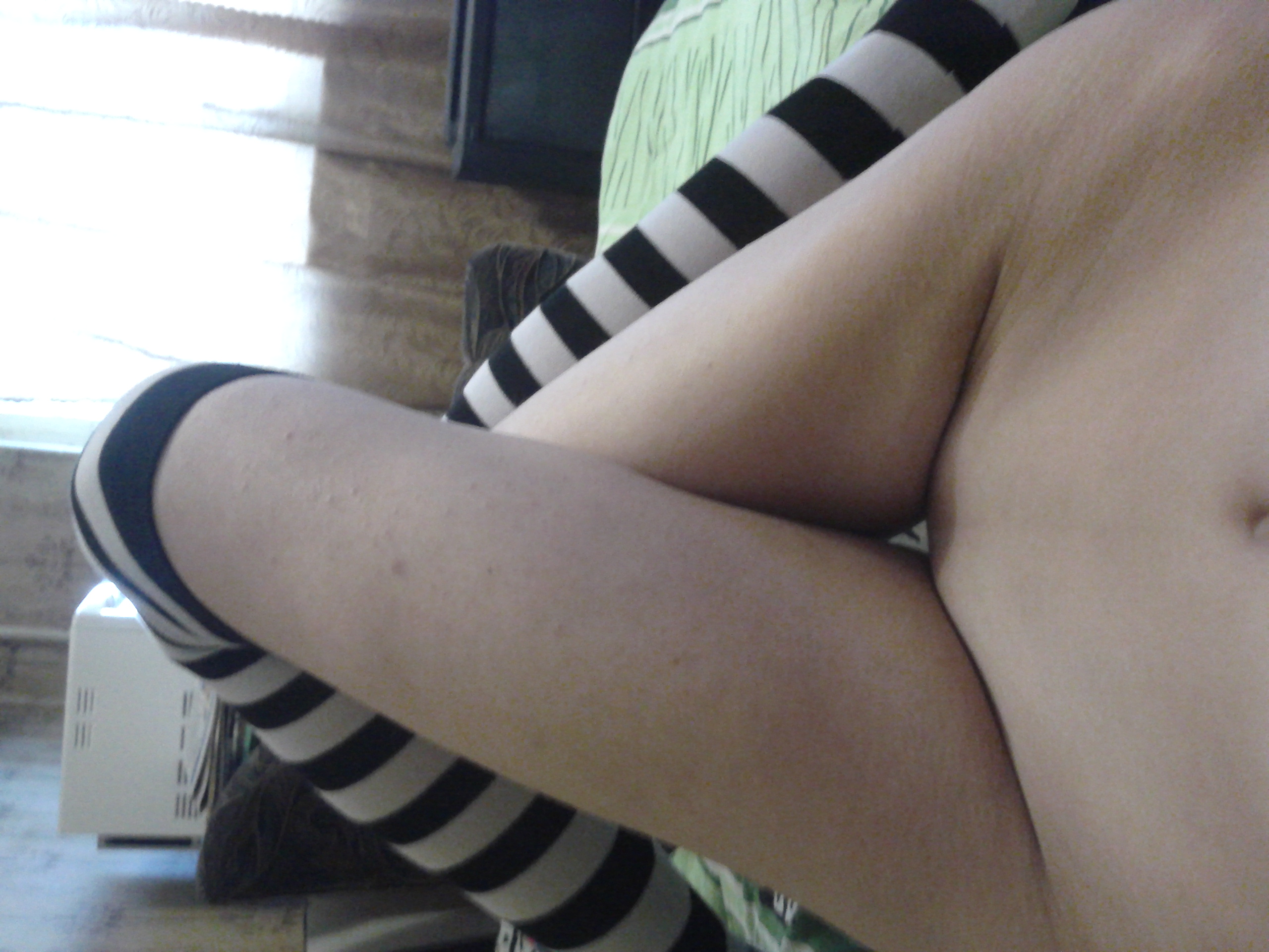 long_legs mound_of_venus nastya photo shaved_pussy striped_legwear window