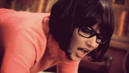 animated bobbi_starr brown_hair cosplay doggy_style gif glasses open_mouth scooby-doo scooby-doo:_a_xxx_parody short_hair solo_focus velma_dinkley