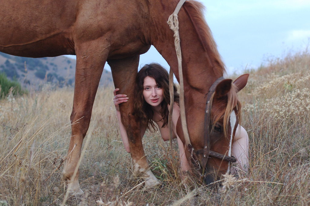 all_fours animal brunette exhibitionism female horse long_hair nude outdoor photo