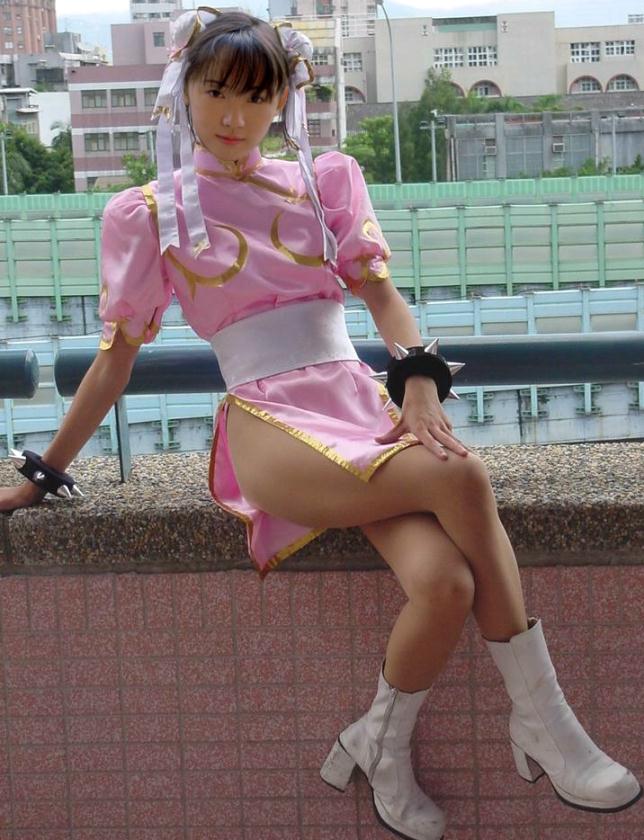 bracelet capcom china_dress chinese_clothes chun-li cosplay female female_only jewelry pantyhose solo spiked_bracelet spikes street_fighter