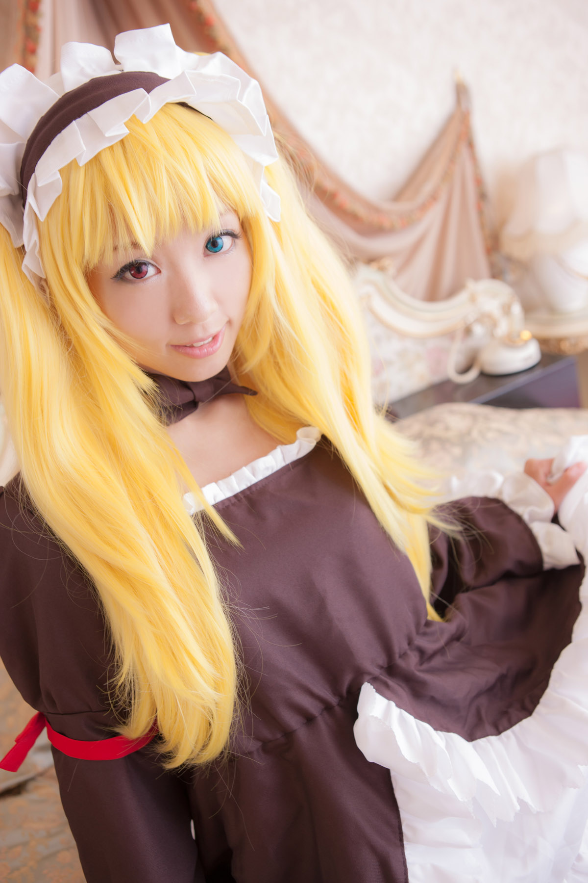 asian blonde_hair breasts cosplay dress female high_heels large_breasts long_hair shoes solo thighhighs twintails