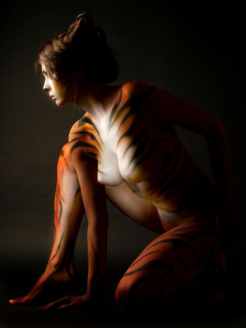 1girl animal animal_paint bodypaint breasts classy_furry female female_only photo real_person solo tiger_stripes
