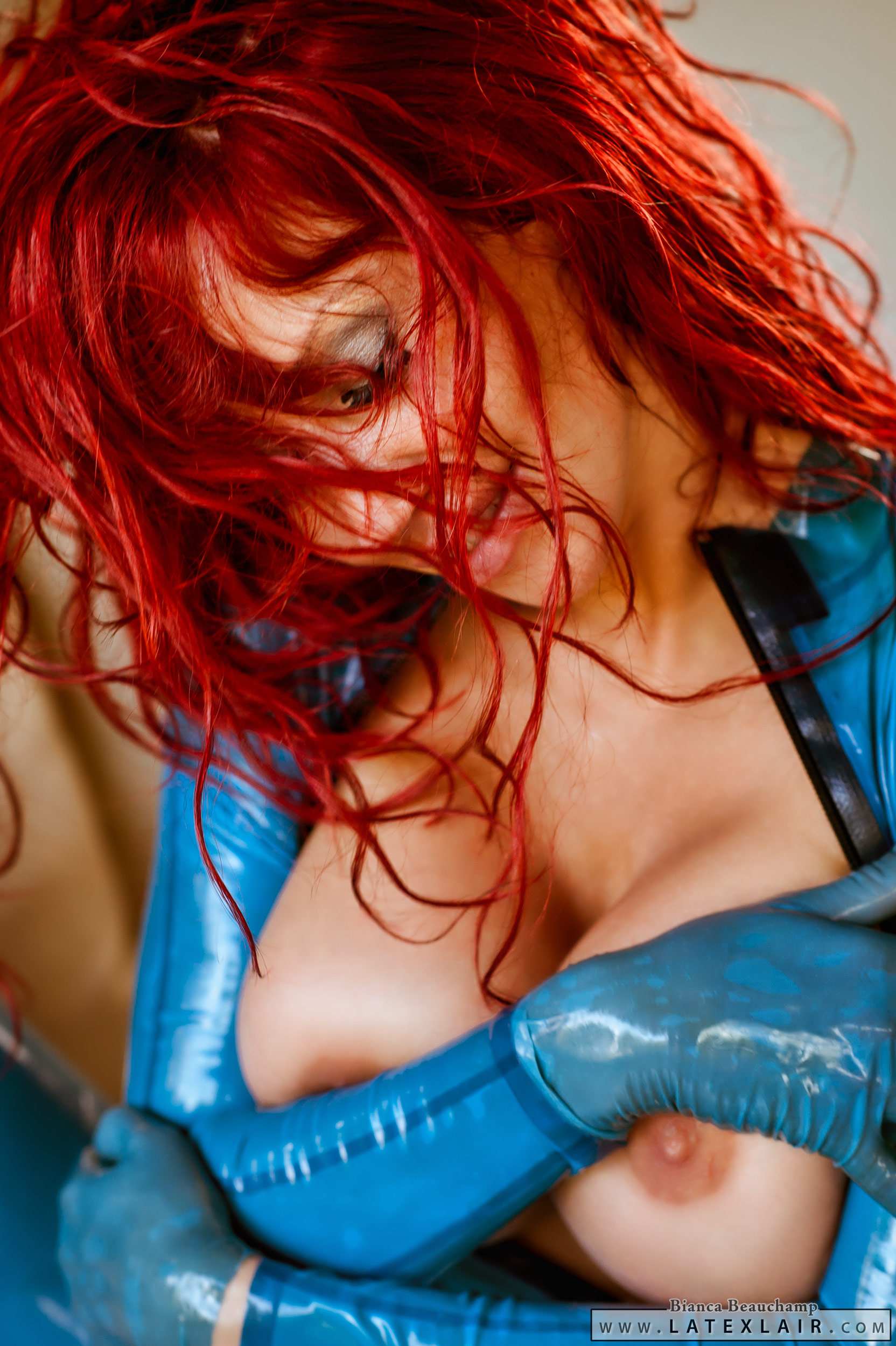 bianca_beauchamp bodysuit breasts female large_breasts latex long_hair red_hair see-through solo watermark